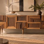 Front view of the Labyrinth bar cabinet in a warm brown wood finish, featuring stepped rectangular borders, recessed geometric panels, a straight top and tapered legs with a centre support.