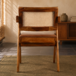 Back view of the OAKINAVA chair with a solid acacia wood frame, natural cane backrest and brown art leather upholstered seat.