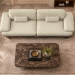 Top view of the Continentale sofa in ivory Aston 902 upholstery, with two broad seat cushions, wide padded arms and matching rectangular lumbar cushions.