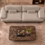 Top view of the Continentale sofa in light beige Aston 924 upholstery, featuring two broad seats, wide padded arms and matching rectangular lumbar cushions.
