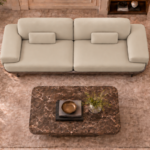 Top view of the Continentale sofa in beige Phantom 104 leatherette, showing two broad seats, wide padded arms, rectangular lumbar cushions and a teak finish base.