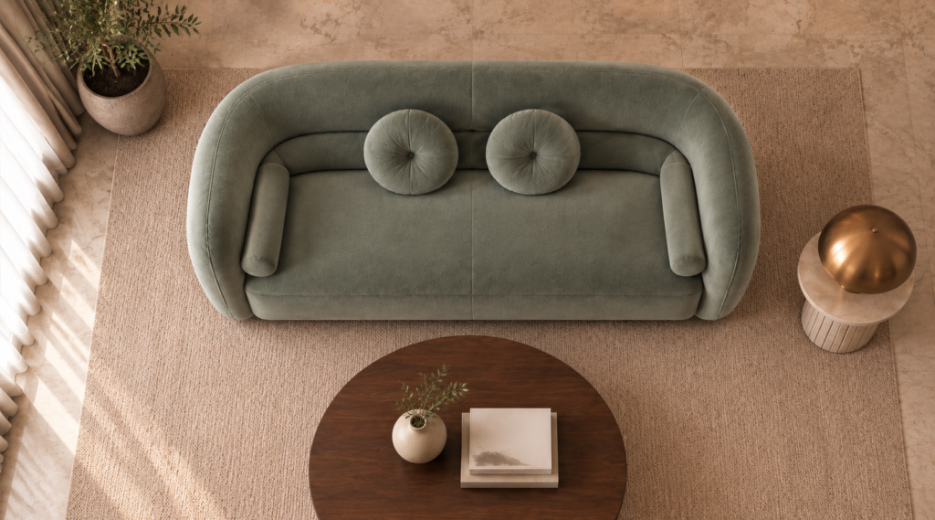 Top view of the Formosa sofa in sage-green Giza 116 upholstery, with a wraparound back, broad seat, two round cushions and side bolsters.