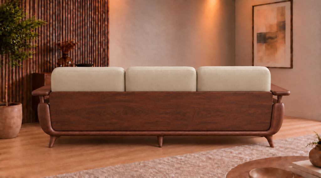 Rear view of the Grand Turismo Dark Wood three-seater sofa, featuring light beige cushions, a broad wooden back panel with visible grain, rounded armrests, curved side supports and tapered legs.