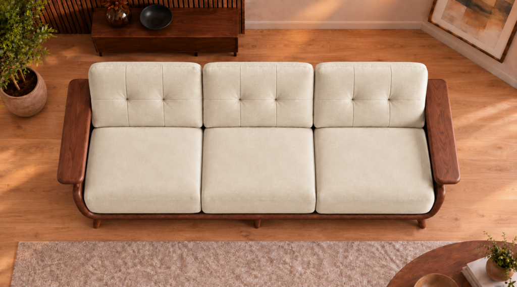 Overhead view of the Grand Turismo Dark Wood sofa in cream Aston 904 patterned fabric, showing three equal seat cushions, rectangular stitching on the back cushions and broad dark wooden armrests.