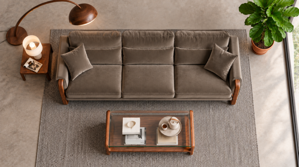 Top view of the Madeira three-seater sofa in taupe patterned Amy 908 upholstery, showing three separate seats, horizontally divided back cushions, two matching pillows and padded arms with exposed teak finish frames.