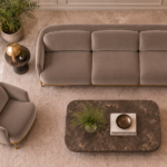Overhead view of the Duet three-seater sofa and matching armchair in taupe patterned Aston 925 upholstery, with separate seat and back cushions, curved upholstered frames and slim gold finish base trim.